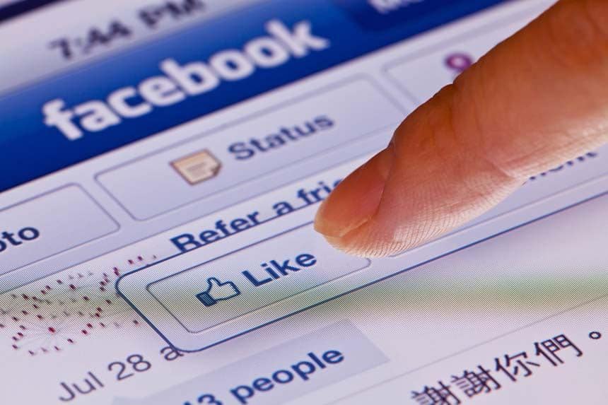 Macro image of clicking the Like button in facebook