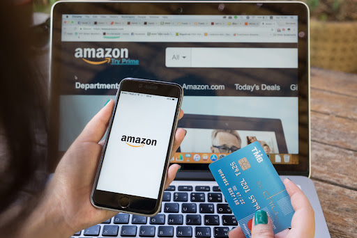  Amazon logo and credit card shopping online. 