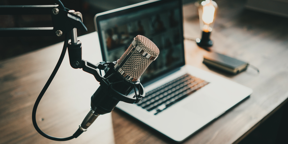 Home-recording-studio-with-laptop-and-microphone.