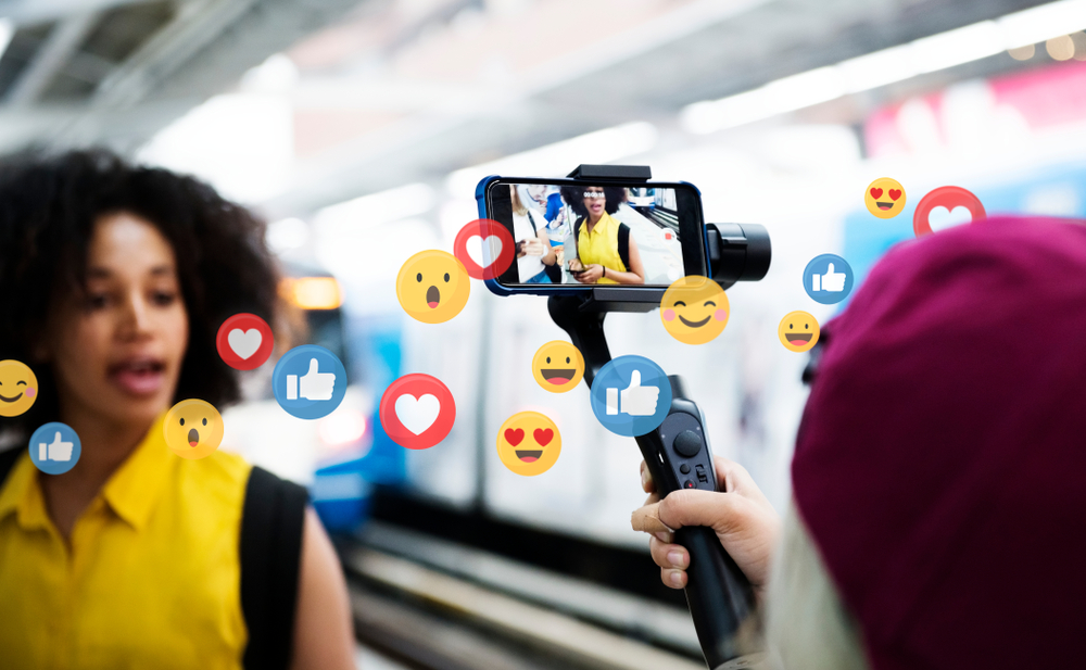 Woman-live-streaming-in-a-train-station