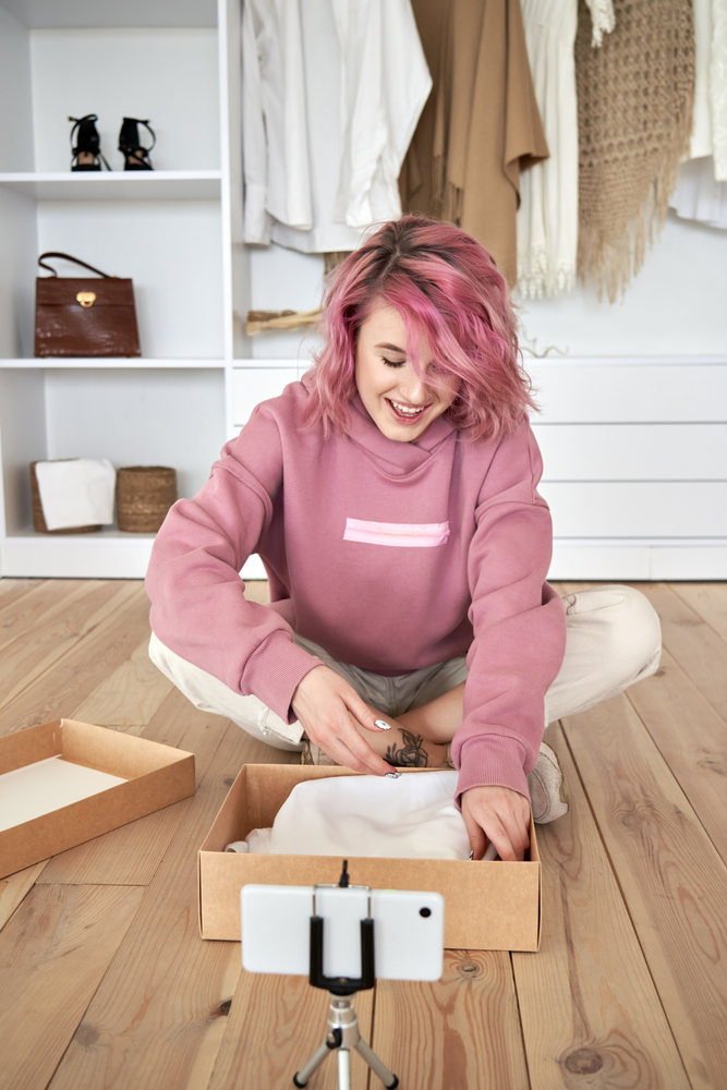 Young-female-influencer-reviewing-a-product-on-video