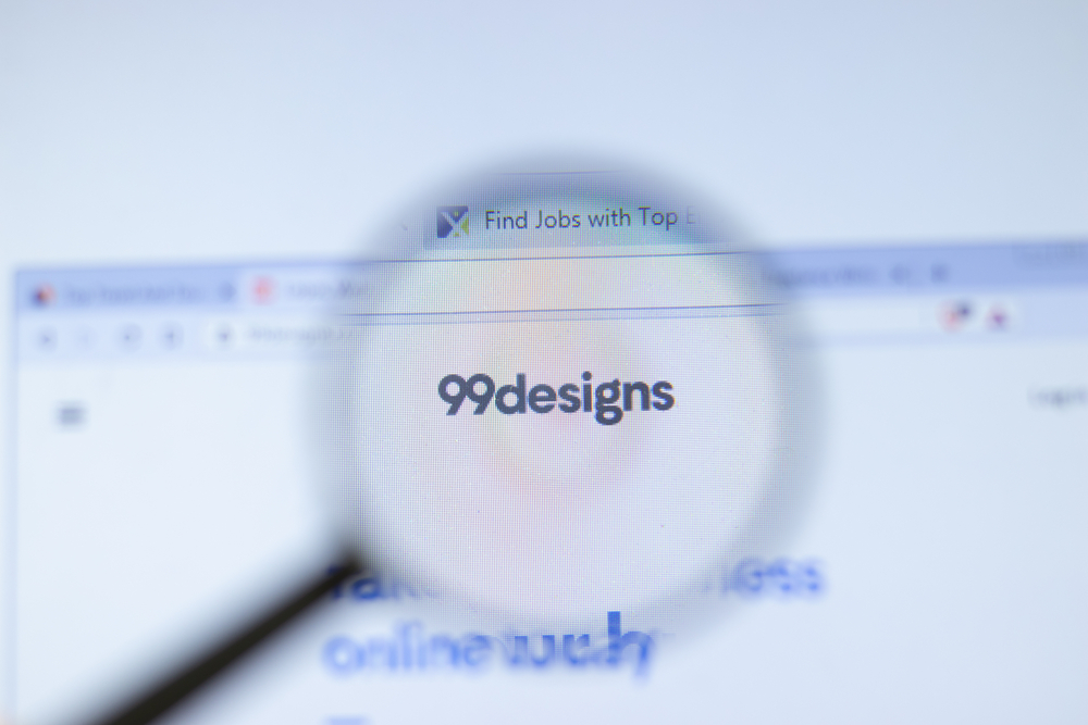99designs-logo-under-a-magnifying-glass-on-a-computer-screen