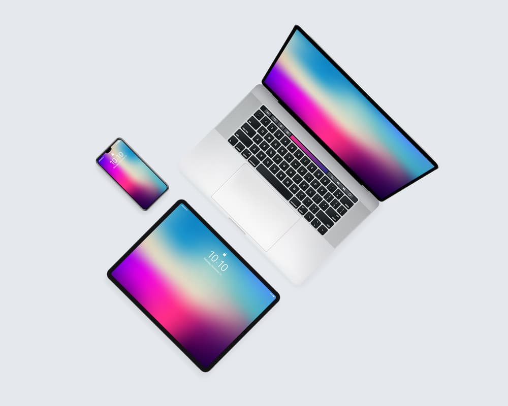 Top view of a laptop, tablet, and smartphone